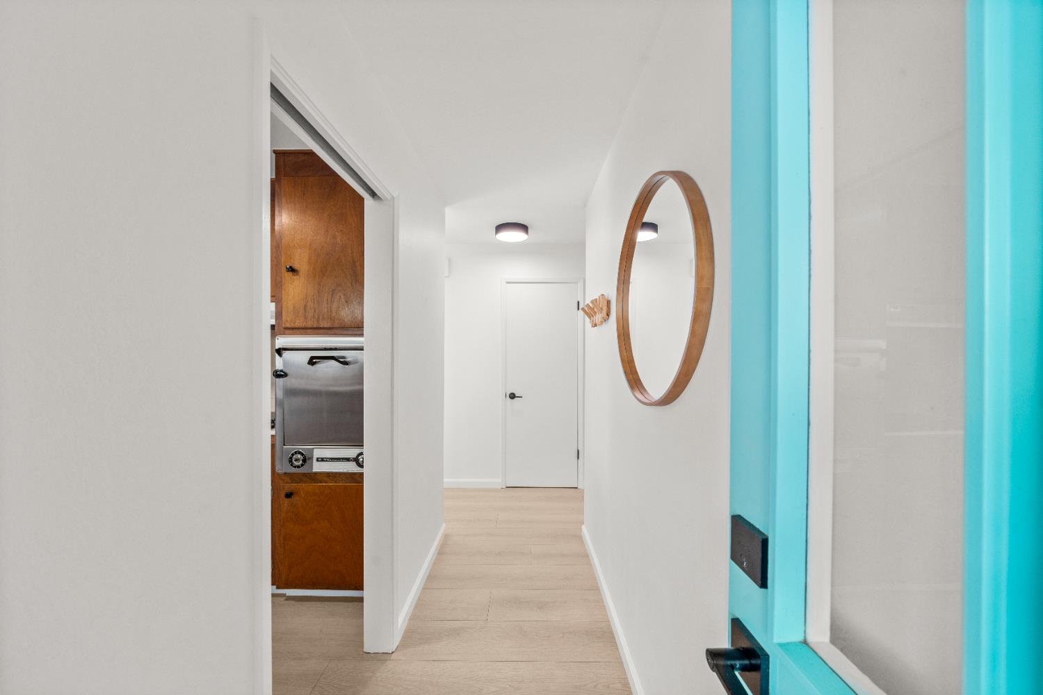 140 Rio Camino Street Auburn, CA 95603 - Photo 8 of 56 a view of a kitchen with a white cabinet and a window