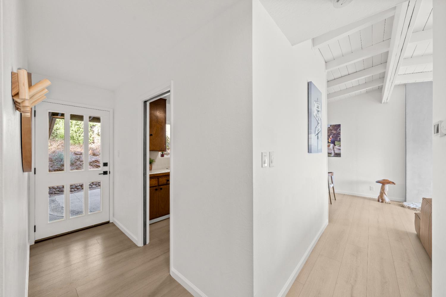 140 Rio Camino Street Auburn, CA 95603 - Photo 9 of 56 a view of a bedroom with wooden floor and windows