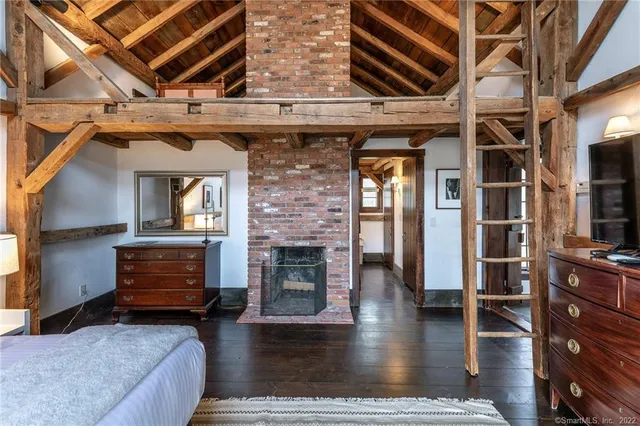 a bathroom with a tub and shower
