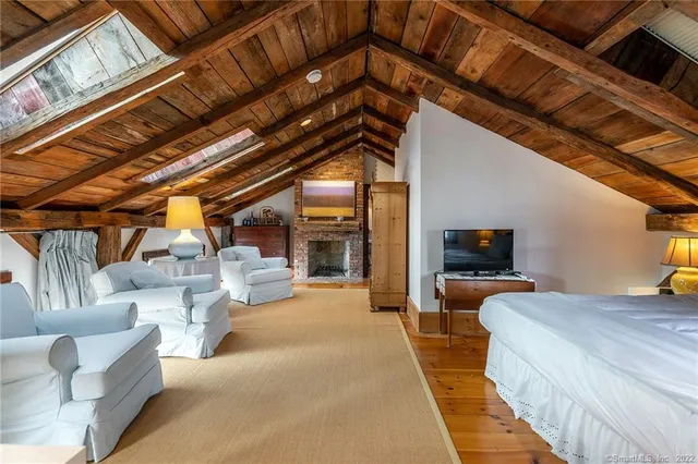 a bed room with a bed and a walk in closet