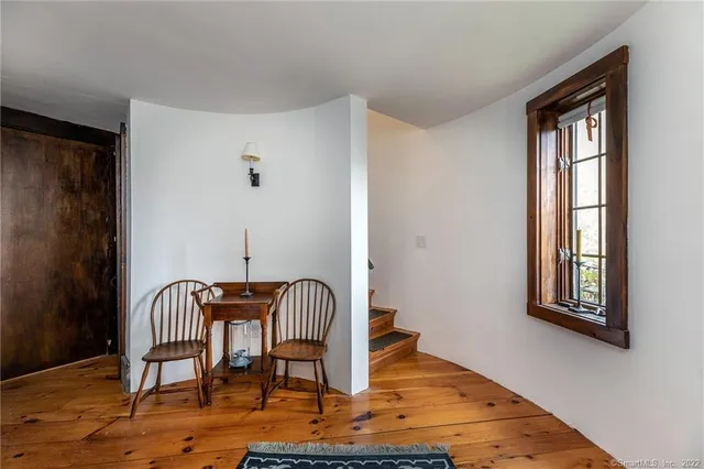 an outdoor space with furniture and umbrella