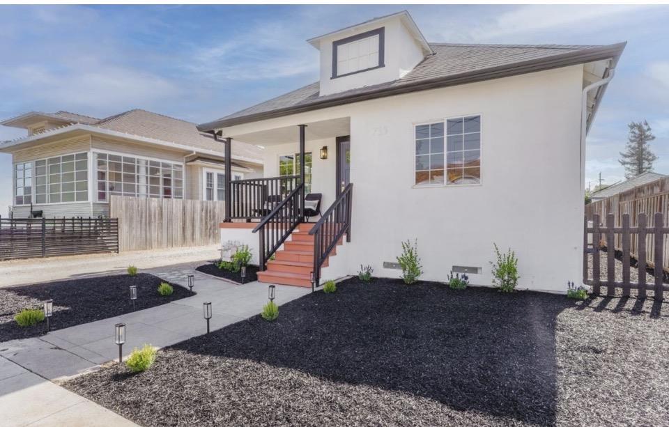735 Locust Street San Jose, CA 95110 - Photo 2 of 21 a view of a house with a yard