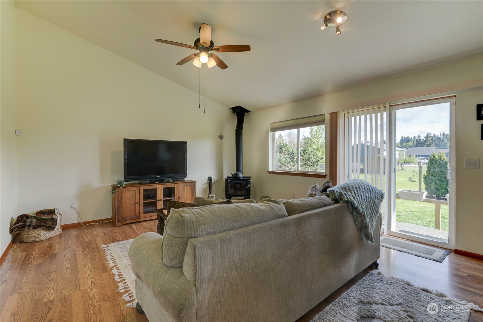 9425 180th Way Southwest Rochester, WA 98579 - Photo 17 of 37 a living room with furniture and a flat screen tv