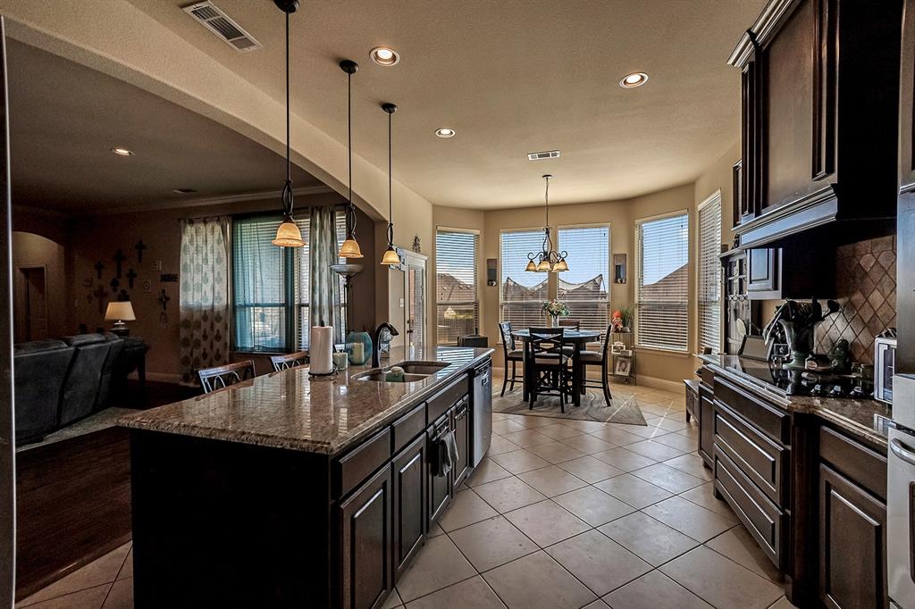 3206 Meadow Ridge Drive Midlothian, TX 76065 - Photo 26 of 37 a kitchen with counter space cabinets and appliances