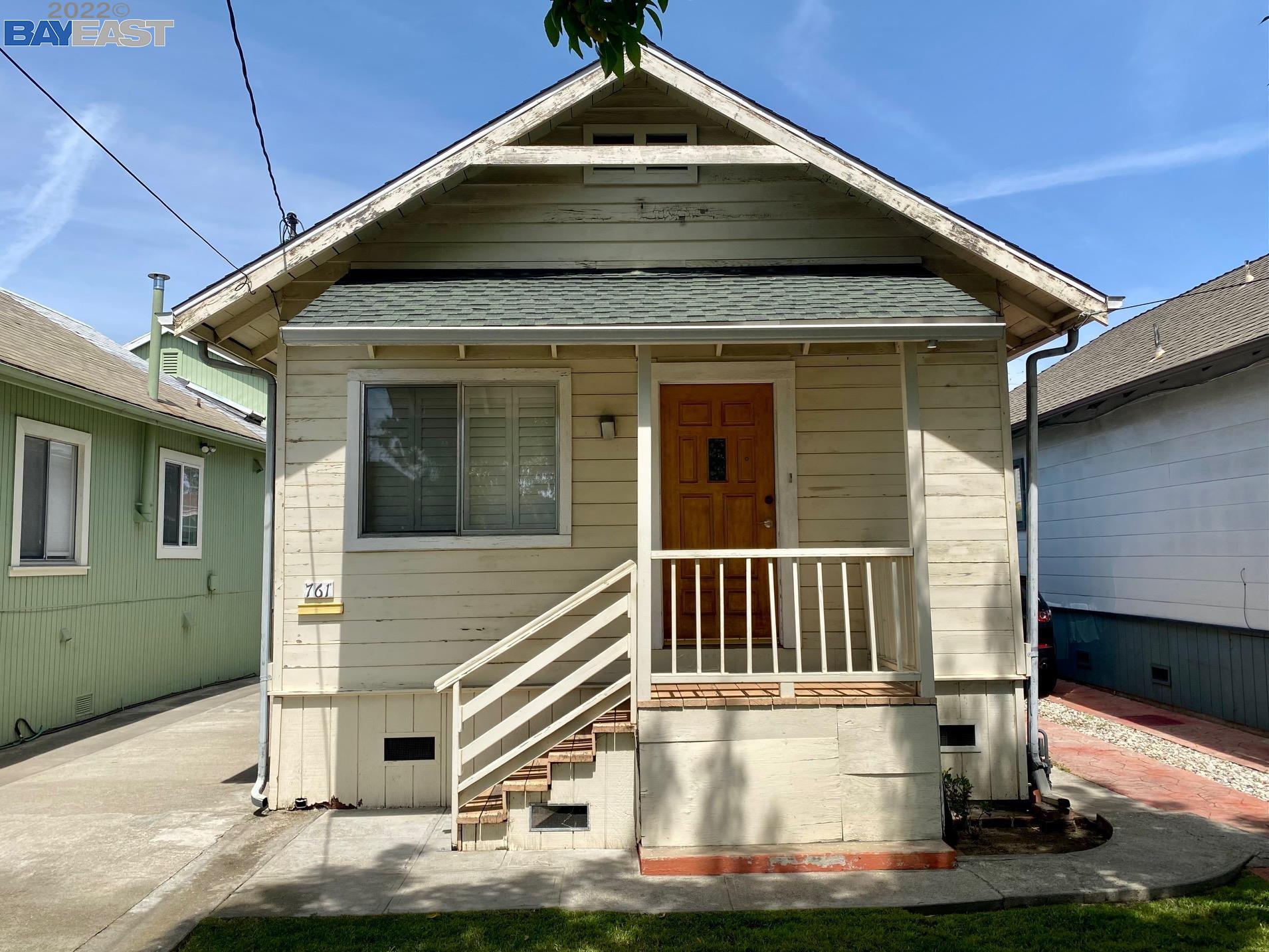 a front view of a house with garage