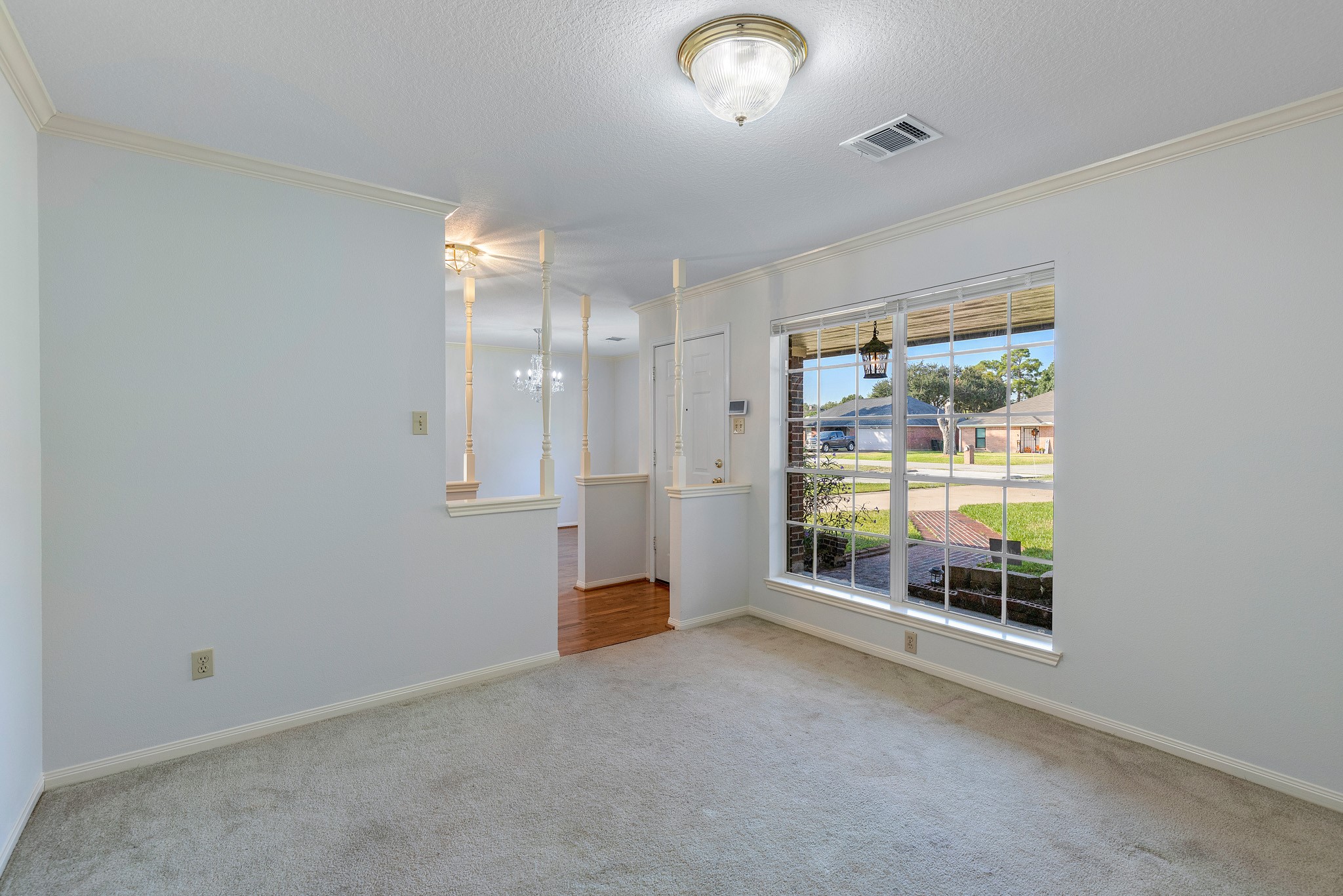 8018 Holiday Lane Houston, TX 77075 - Photo 9 of 42 an empty room with windows