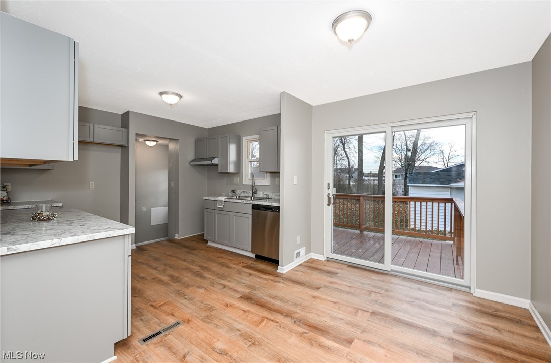 6079 Fry Road Brook Park, OH 44142 - Photo 14 of 35 Dining area with sliding doors to deck.