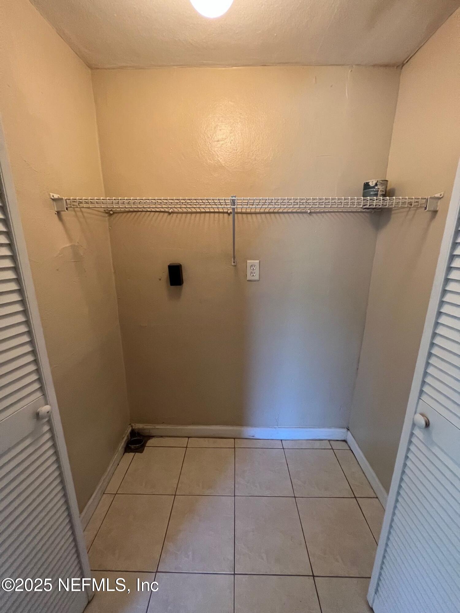 2614 College Street, Unit 1 Jacksonville, FL 32204 - Photo 11 of 17 a view of a room with racks on the wall