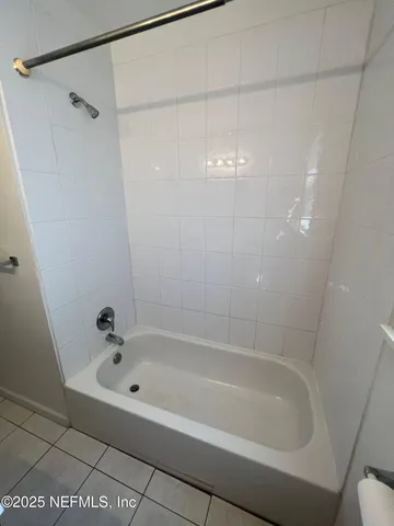 a bathroom with a bathtub