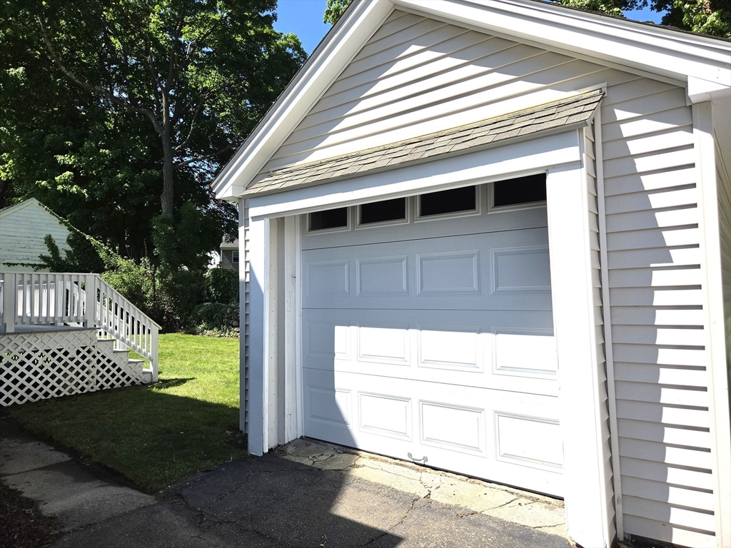 25 Waldeck Road Milton, MA 02186 - Photo 34 of 34 a view of a small house with backyard