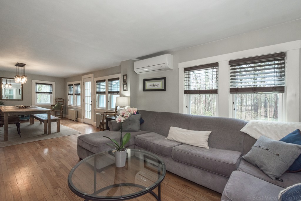 33 Burnham Road Bolton, MA 01740 - Photo 9 of 26 a living room with furniture and a large window