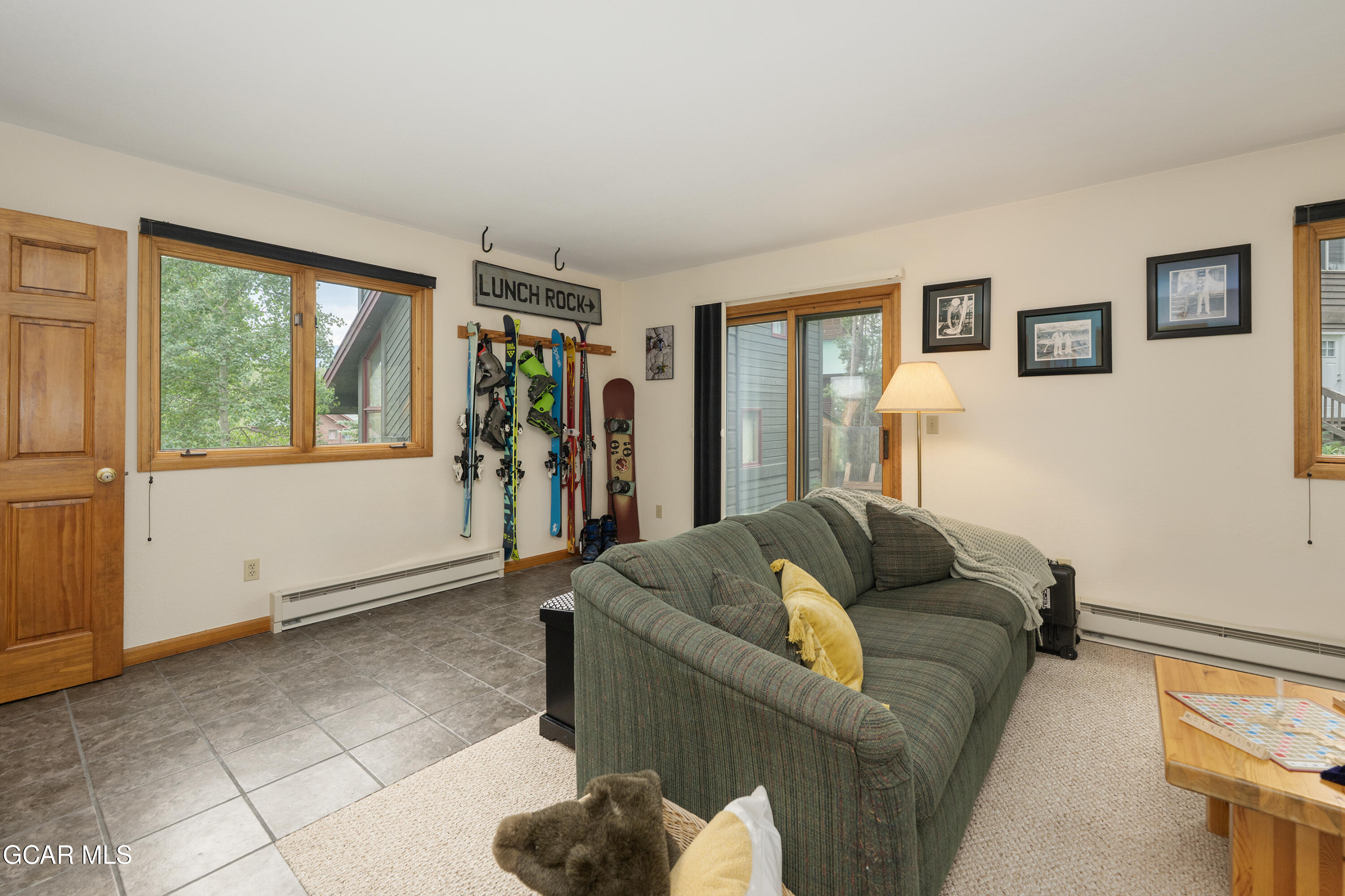 820 Wolverine Lane, Unit 3 Fraser, CO 80442 - Photo 25 of 43 a living room with furniture and a window