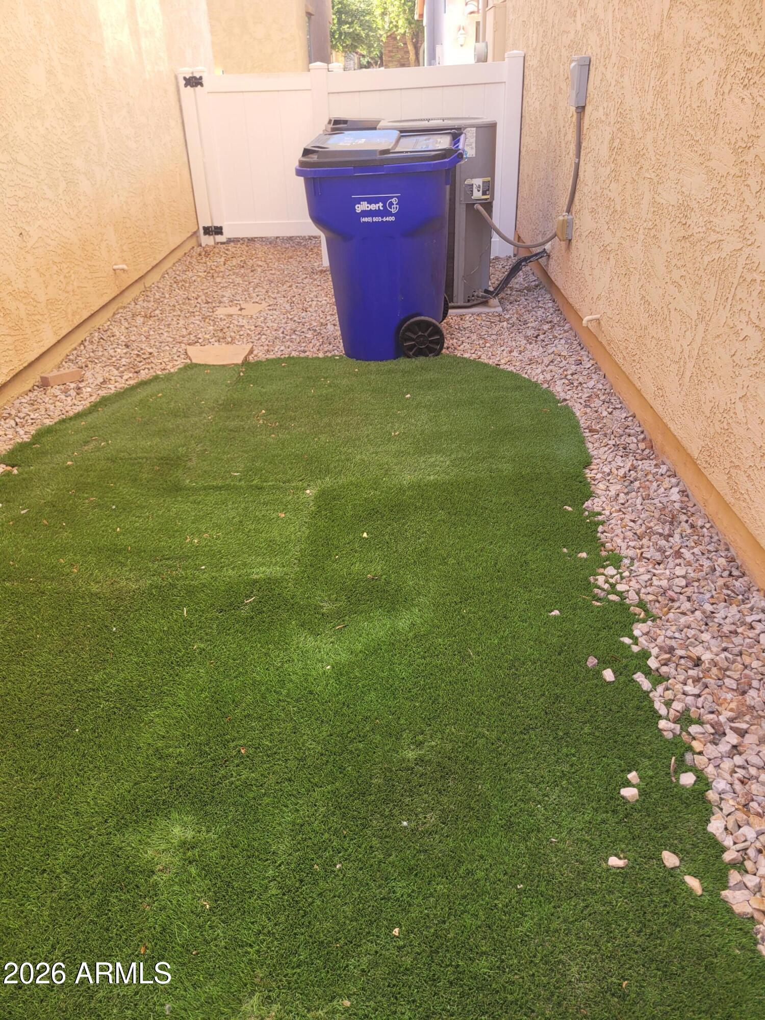 1453 South Sinova Avenue Gilbert, AZ 85296 - Photo 40 of 46 a view of a backyard