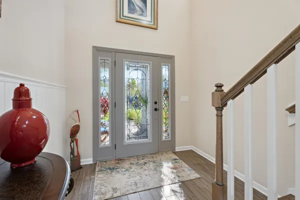 a kitchen with stainless steel appliances a sink stove and cabinets