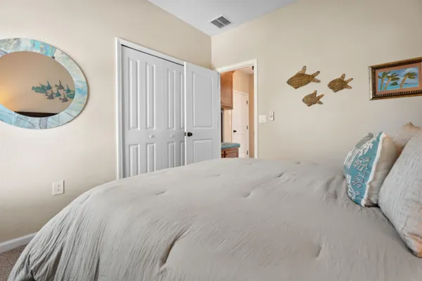 a view of a terrace with furniture and floor to ceiling window