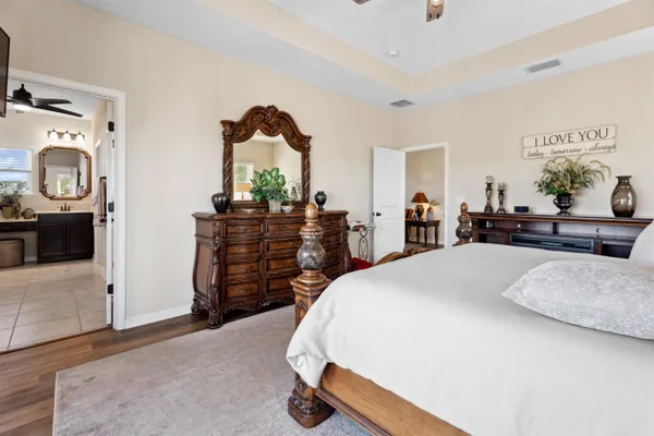 an aerial view of a house with a swimming pool