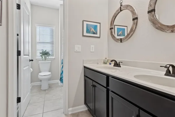 a view of workspace with wooden floor and windows