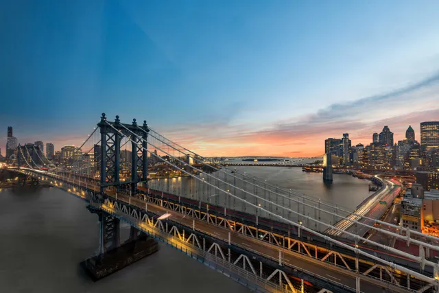 a bathroom with a sink a mirror and a bathtub