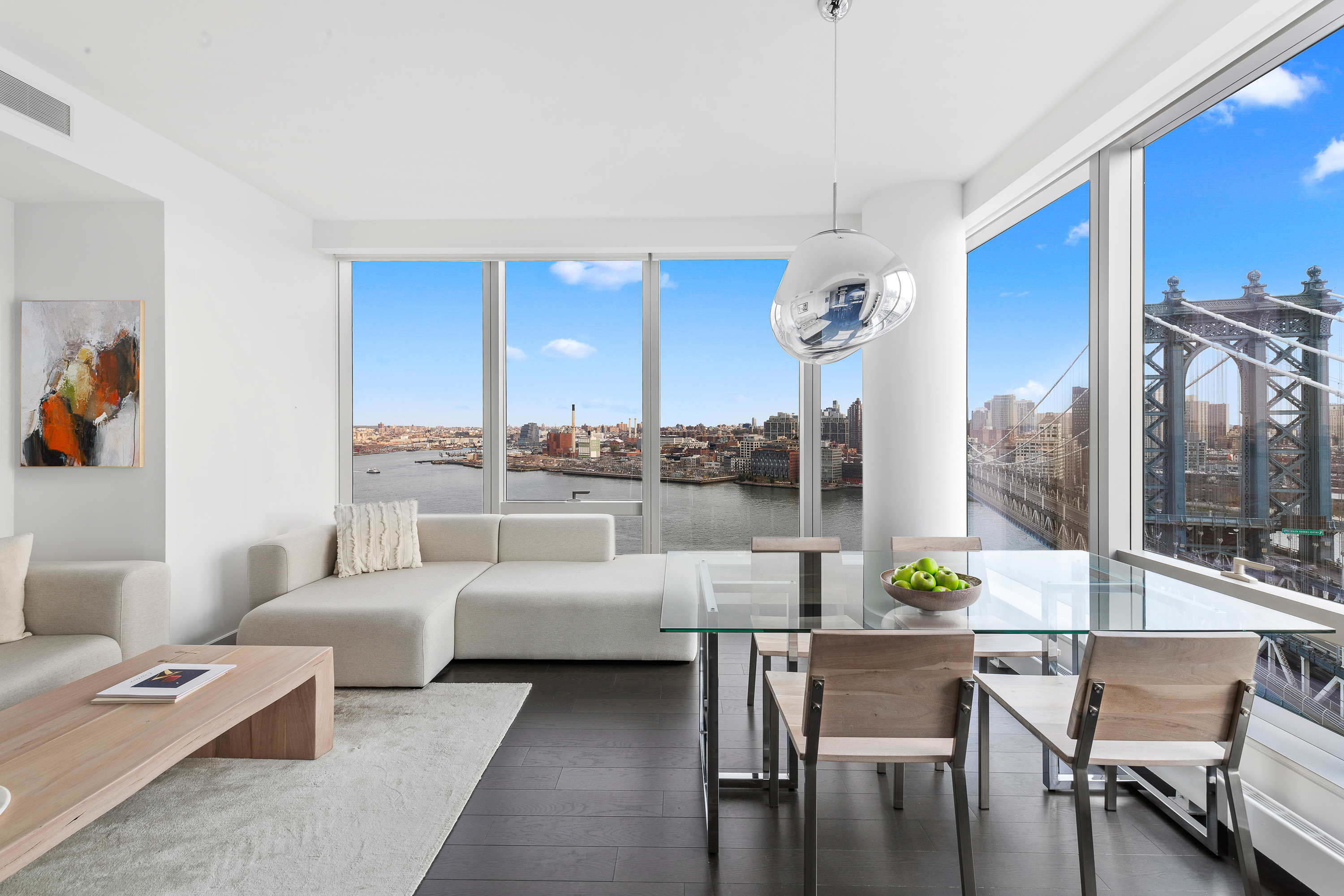 252 South Street, Unit 25D Manhattan, NY 10002 - Photo 2 of 36 a living room with furniture and a table