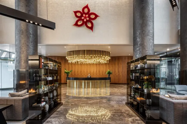 a view of a patio with couches chairs and potted plants