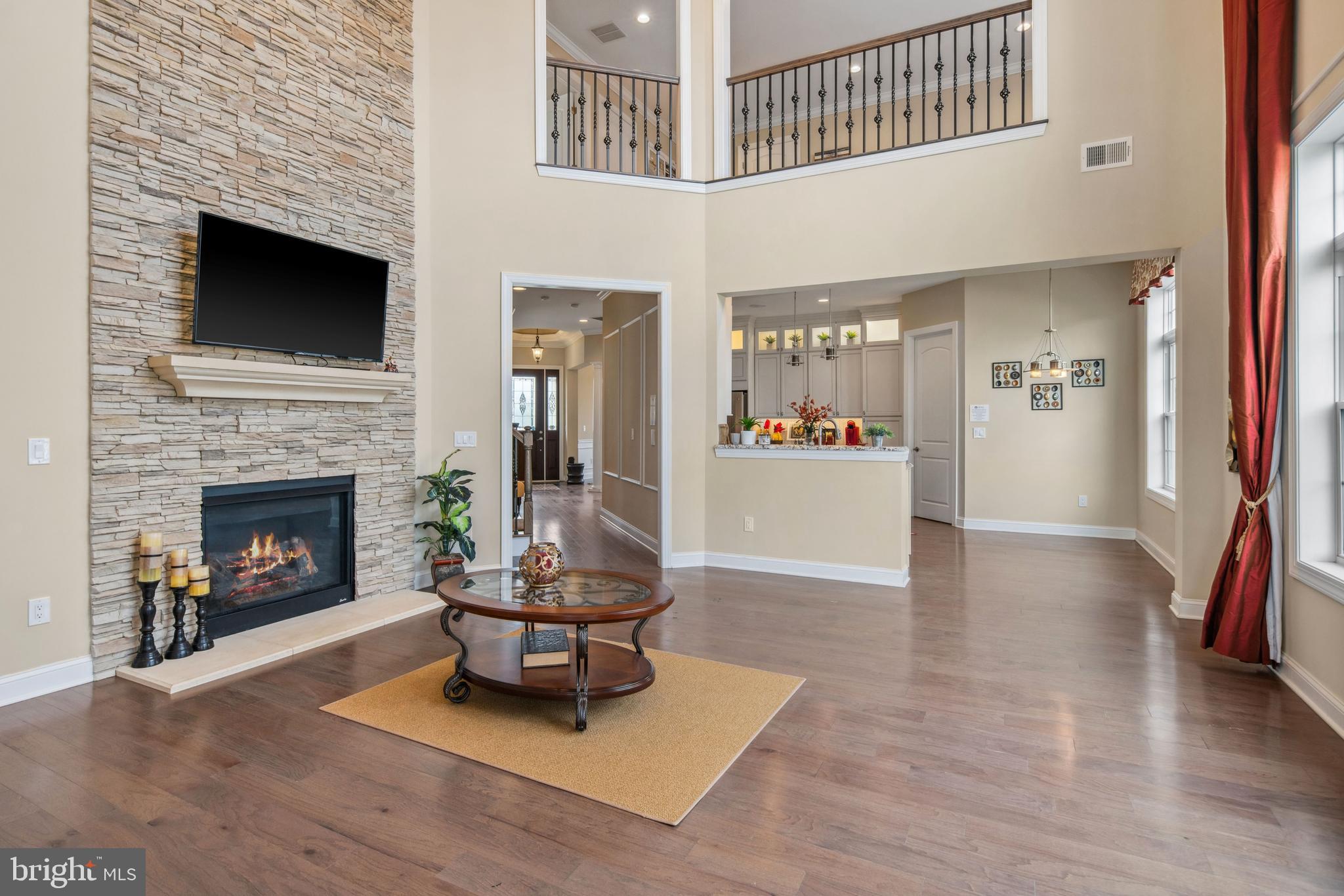 2 Samjan Circle Hightstown, NJ 08520 - Photo 11 of 36 a living room with furniture and a fireplace