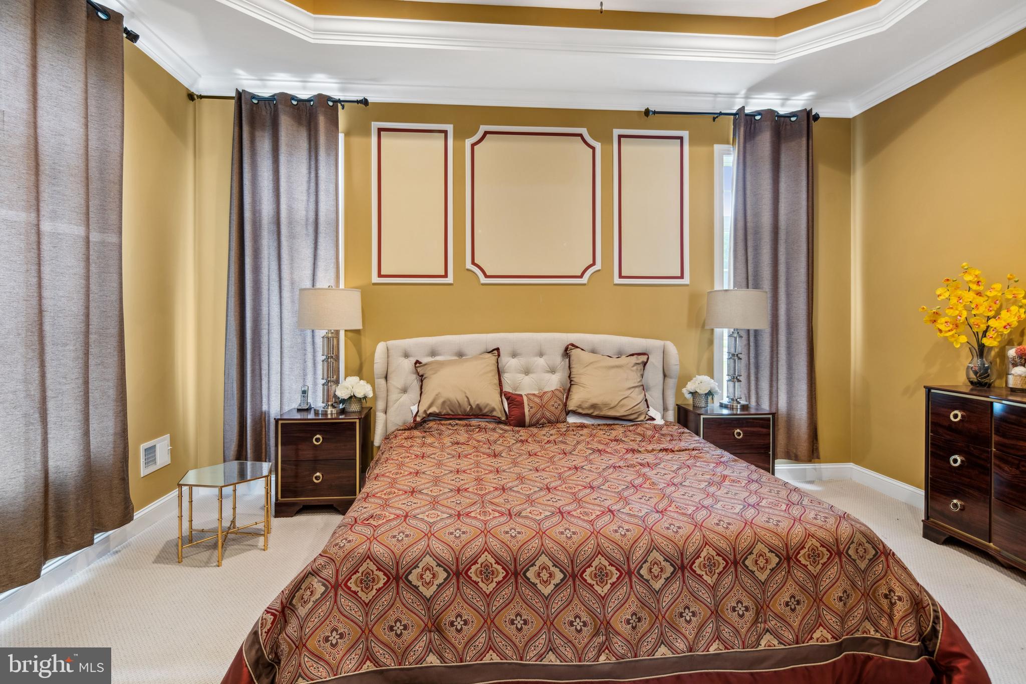 2 Samjan Circle Hightstown, NJ 08520 - Photo 17 of 36 a bedroom with a bed and dresser with mirror