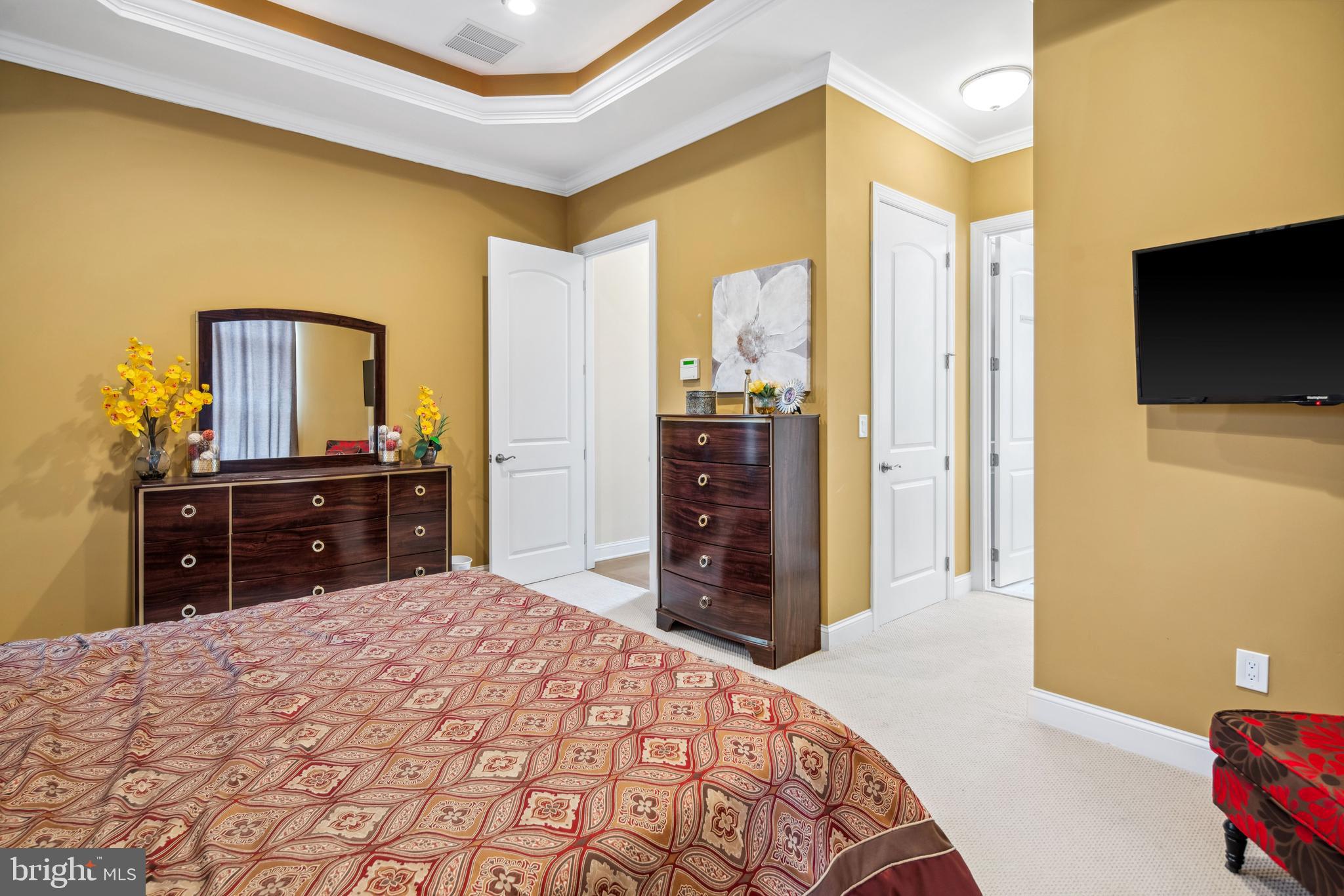 2 Samjan Circle Hightstown, NJ 08520 - Photo 18 of 36 a bedroom with a bed and a flat screen tv