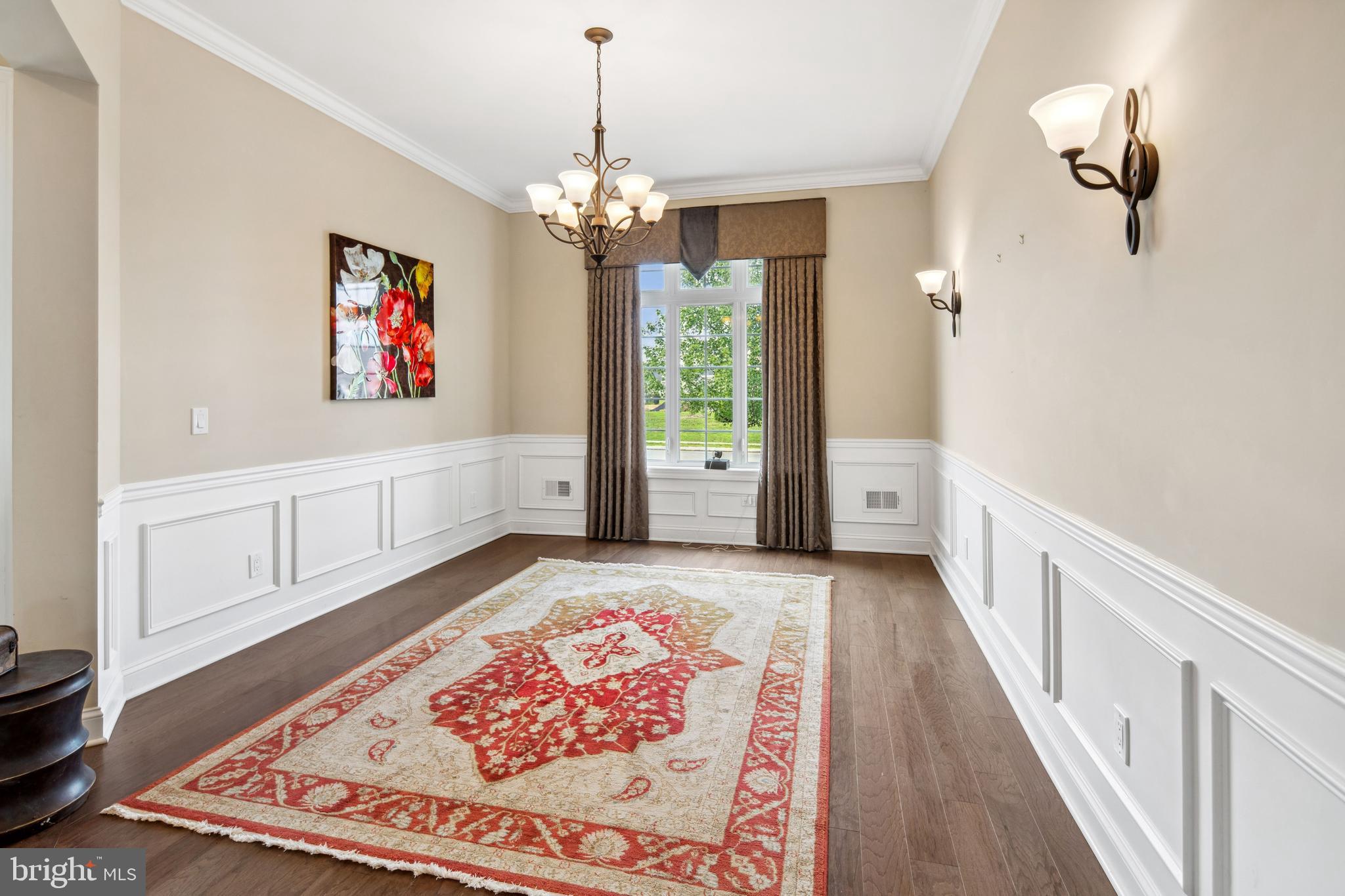 2 Samjan Circle Hightstown, NJ 08520 - Photo 21 of 36 a view of a hallway with wooden floor and chandelier