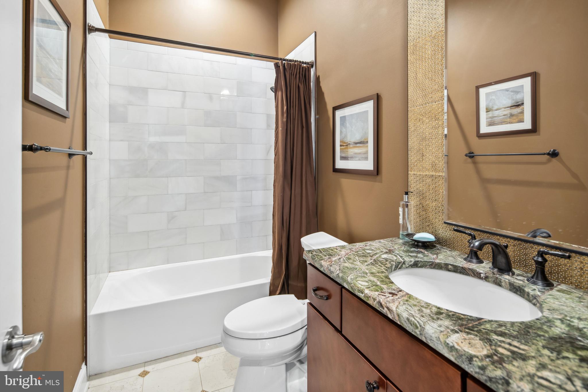 2 Samjan Circle Hightstown, NJ 08520 - Photo 26 of 36 a bathroom with a granite countertop sink toilet and shower