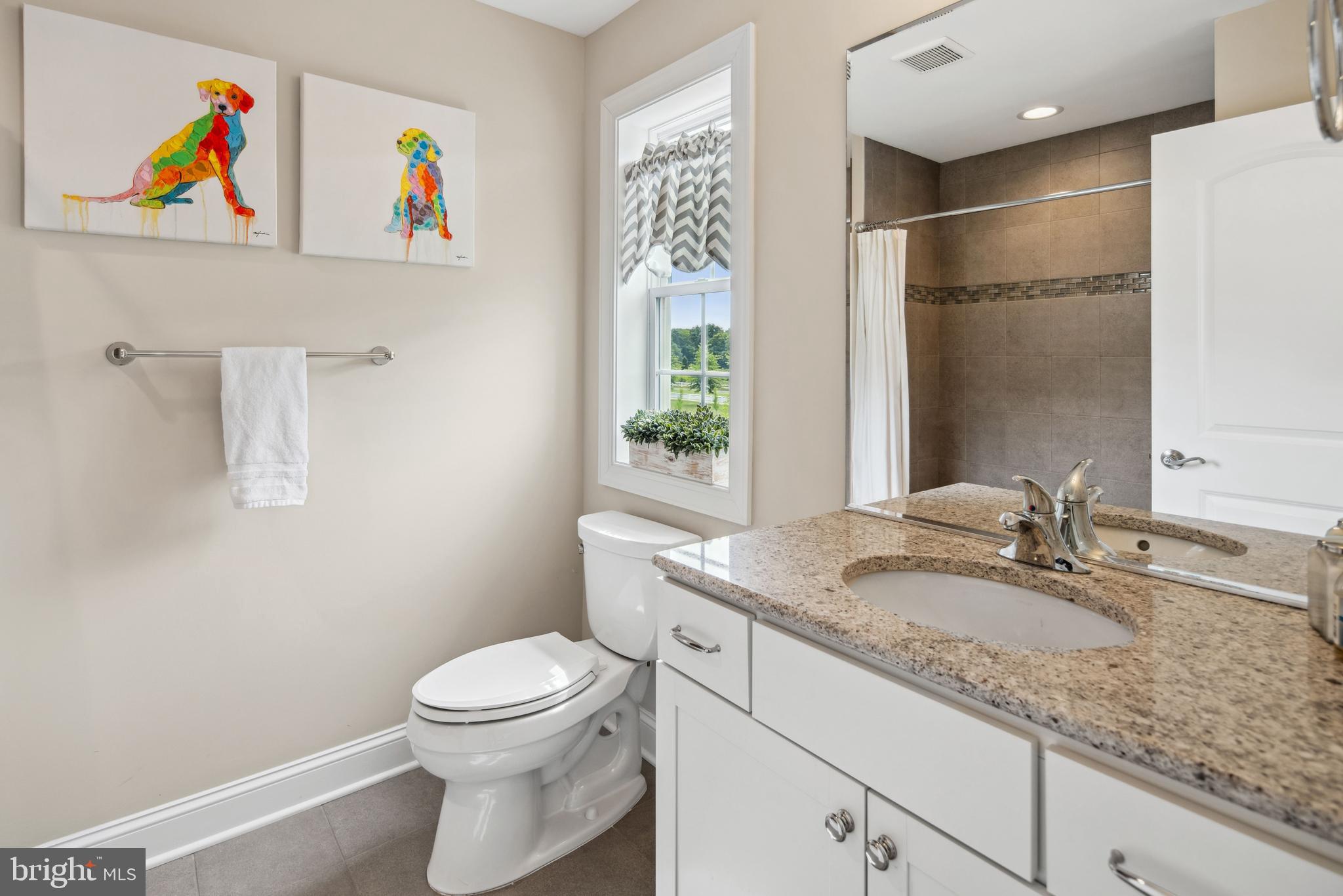 2 Samjan Circle Hightstown, NJ 08520 - Photo 32 of 36 a bathroom with a granite countertop sink a toilet and a shower