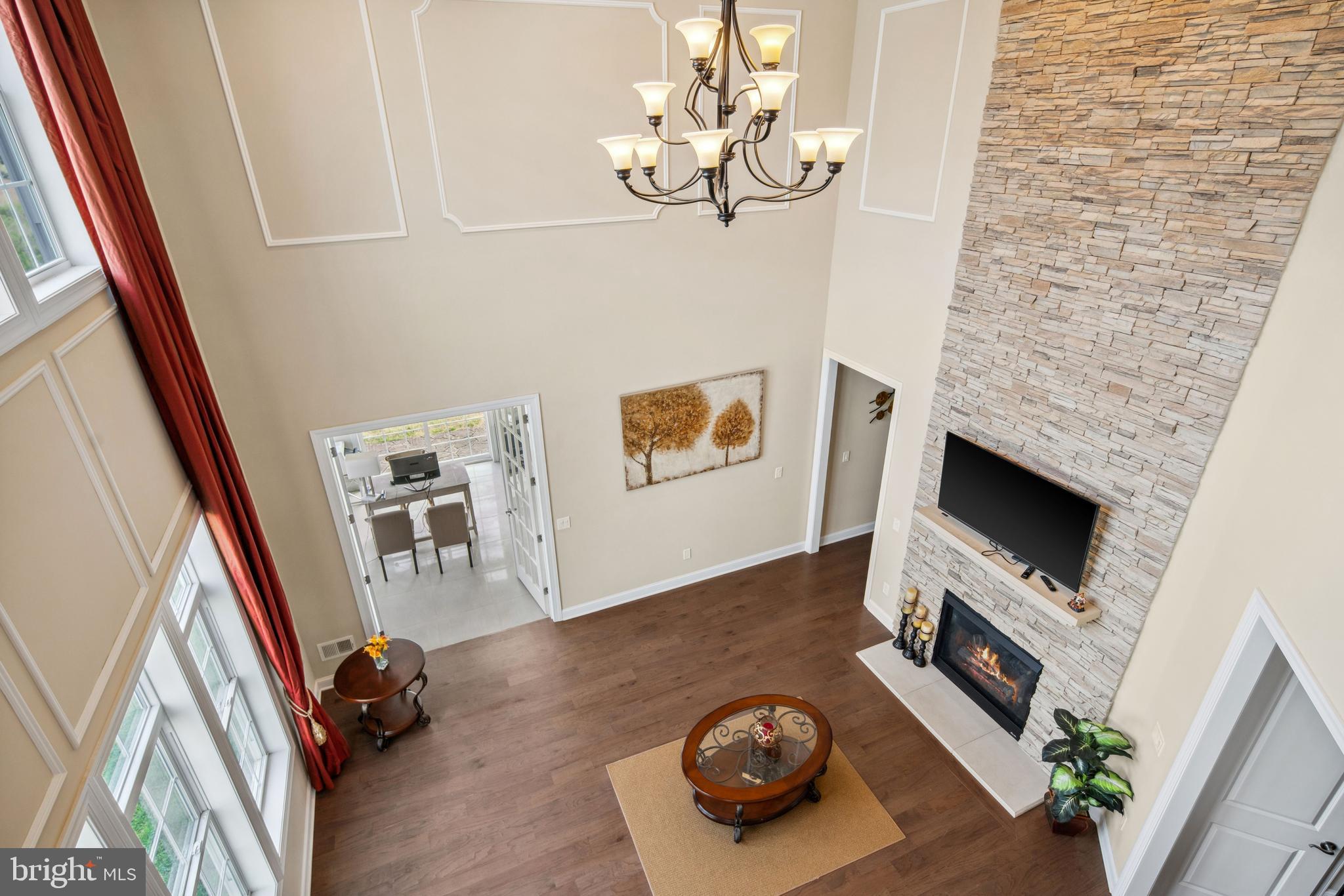 2 Samjan Circle Hightstown, NJ 08520 - Photo 33 of 36 a living room with furniture and a fireplace