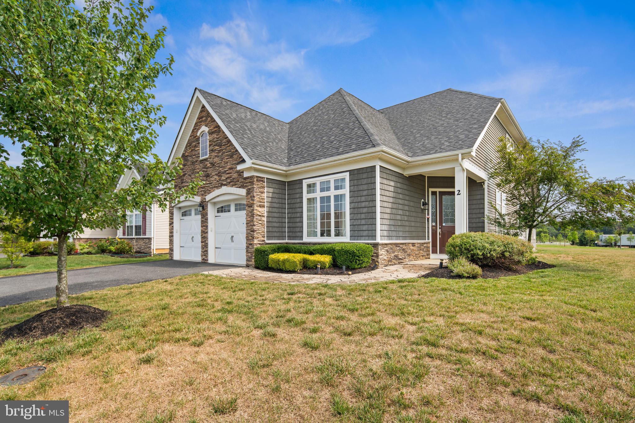 2 Samjan Circle Hightstown, NJ 08520 - Photo 34 of 36 a view of house with yard and outdoor seating
