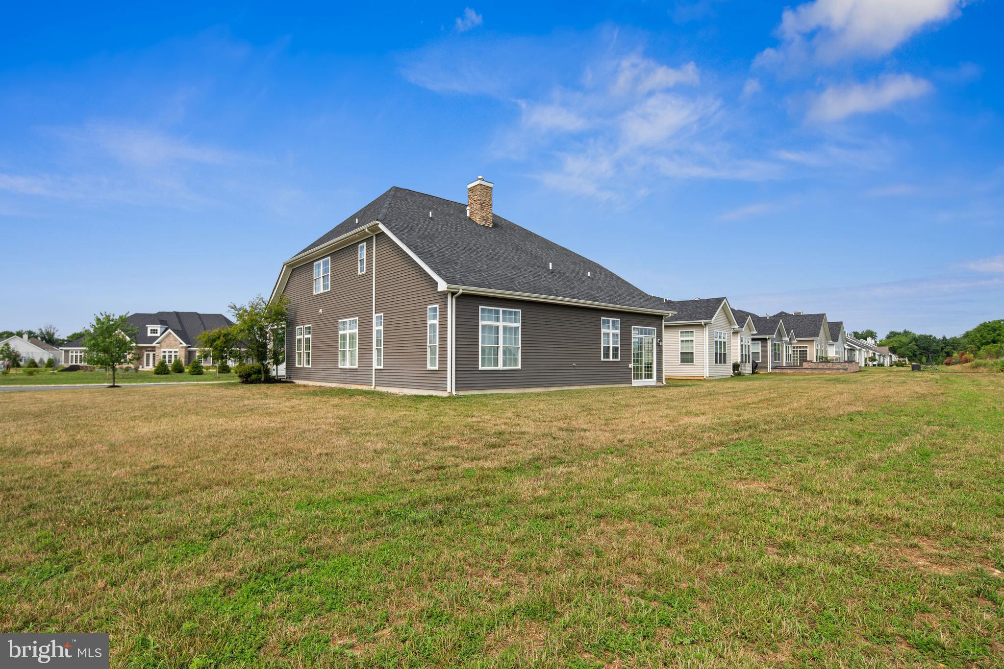 2 Samjan Circle Hightstown, NJ 08520 - Photo 35 of 36 a front view of a house with a yard