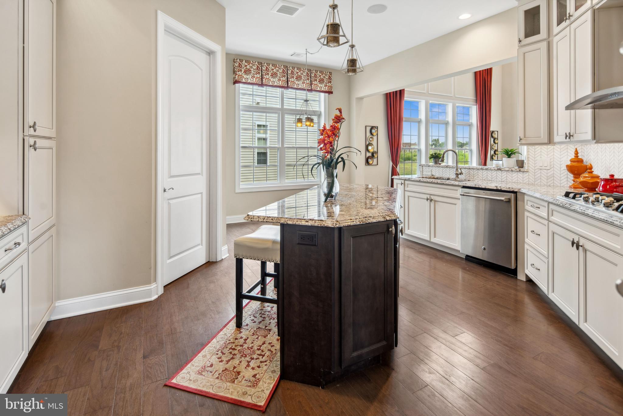 2 Samjan Circle Hightstown, NJ 08520 - Photo 7 of 36 a kitchen with stainless steel appliances granite countertop a sink dishwasher and a refrigerator with wooden floor