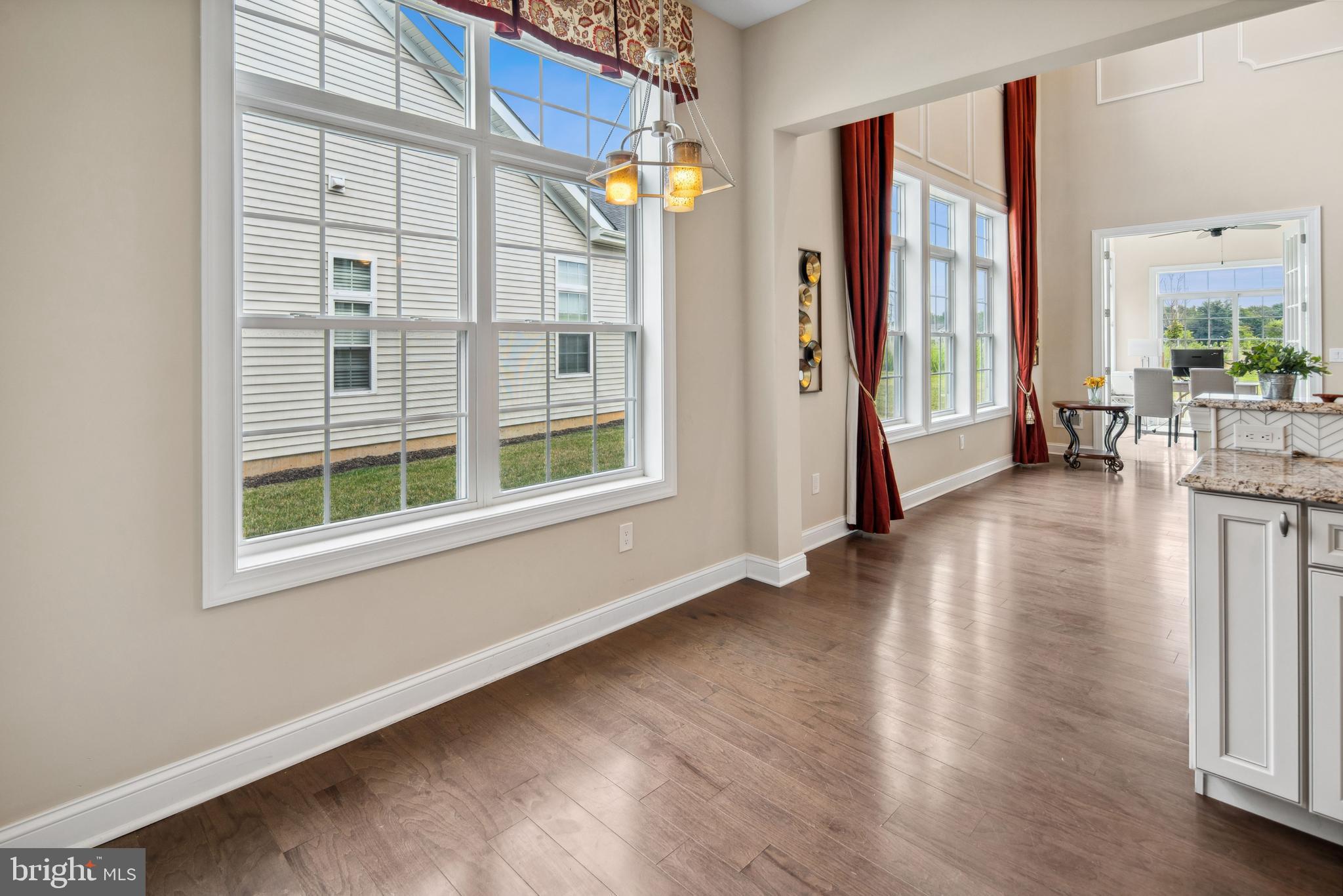 2 Samjan Circle Hightstown, NJ 08520 - Photo 8 of 36 an empty room with wooden floor and windows