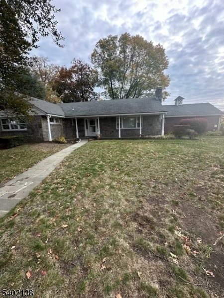 front view of house with a yard