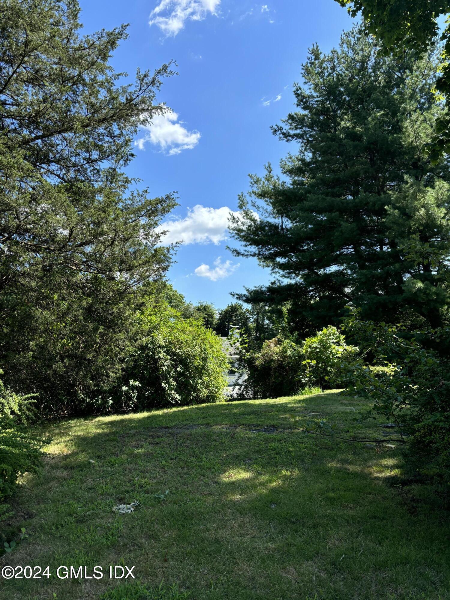 7 River Lane Cos Cob, CT 06807 - Photo 26 of 30 a view of a garden