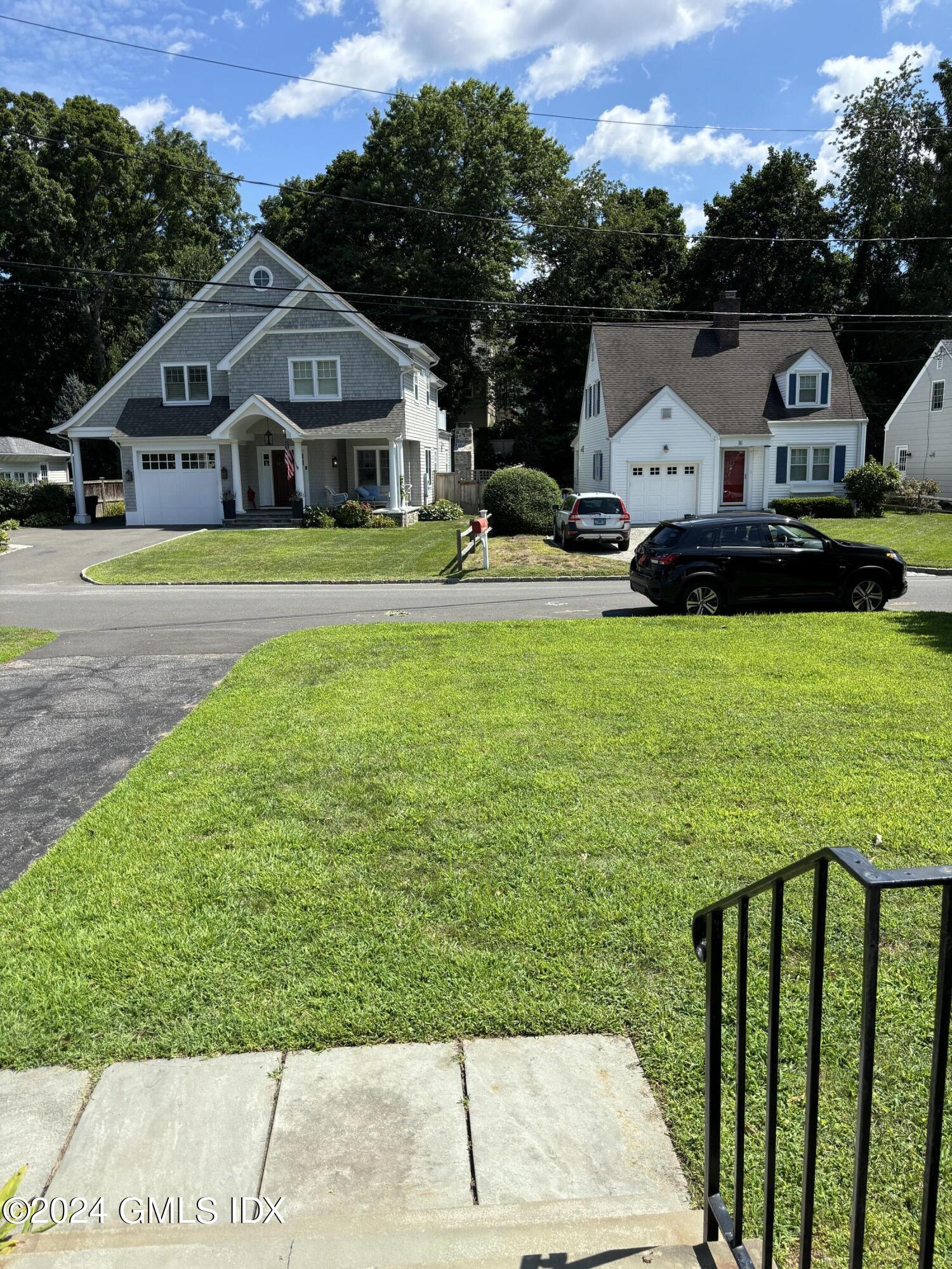 7 River Lane Cos Cob, CT 06807 - Photo 27 of 30 a swimming pool view with a outdoor seating