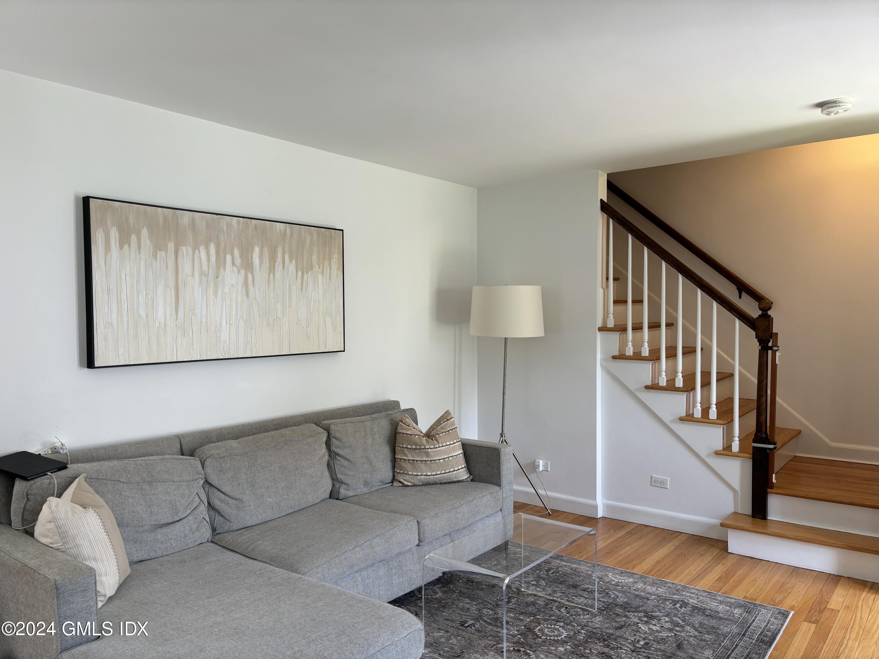 7 River Lane Cos Cob, CT 06807 - Photo 3 of 30 a living room with furniture and wooden floor