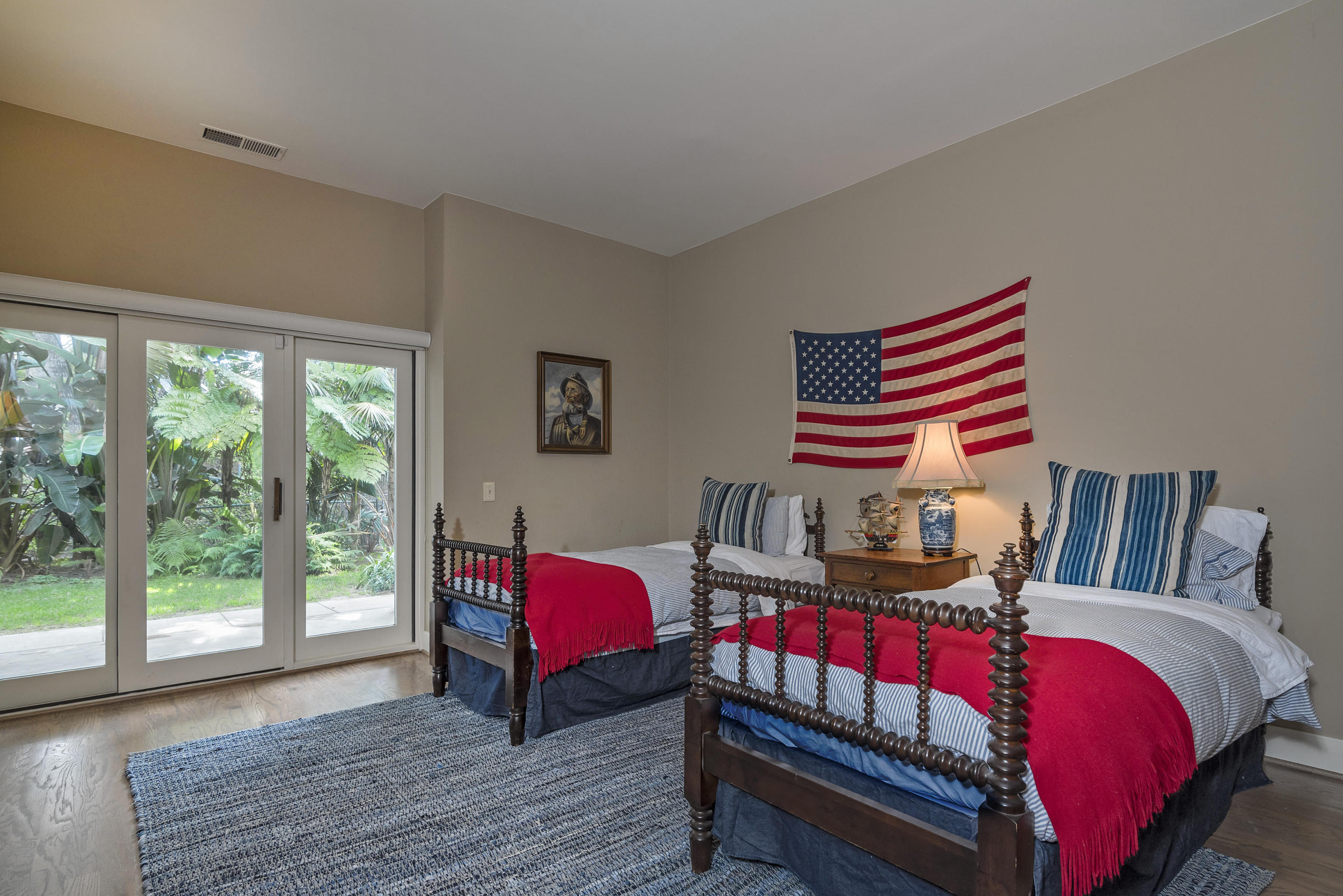 2 Rincon Point Lane Carpinteria, CA 93013 - Photo 14 of 31 a living room with furniture and a floor to ceiling window