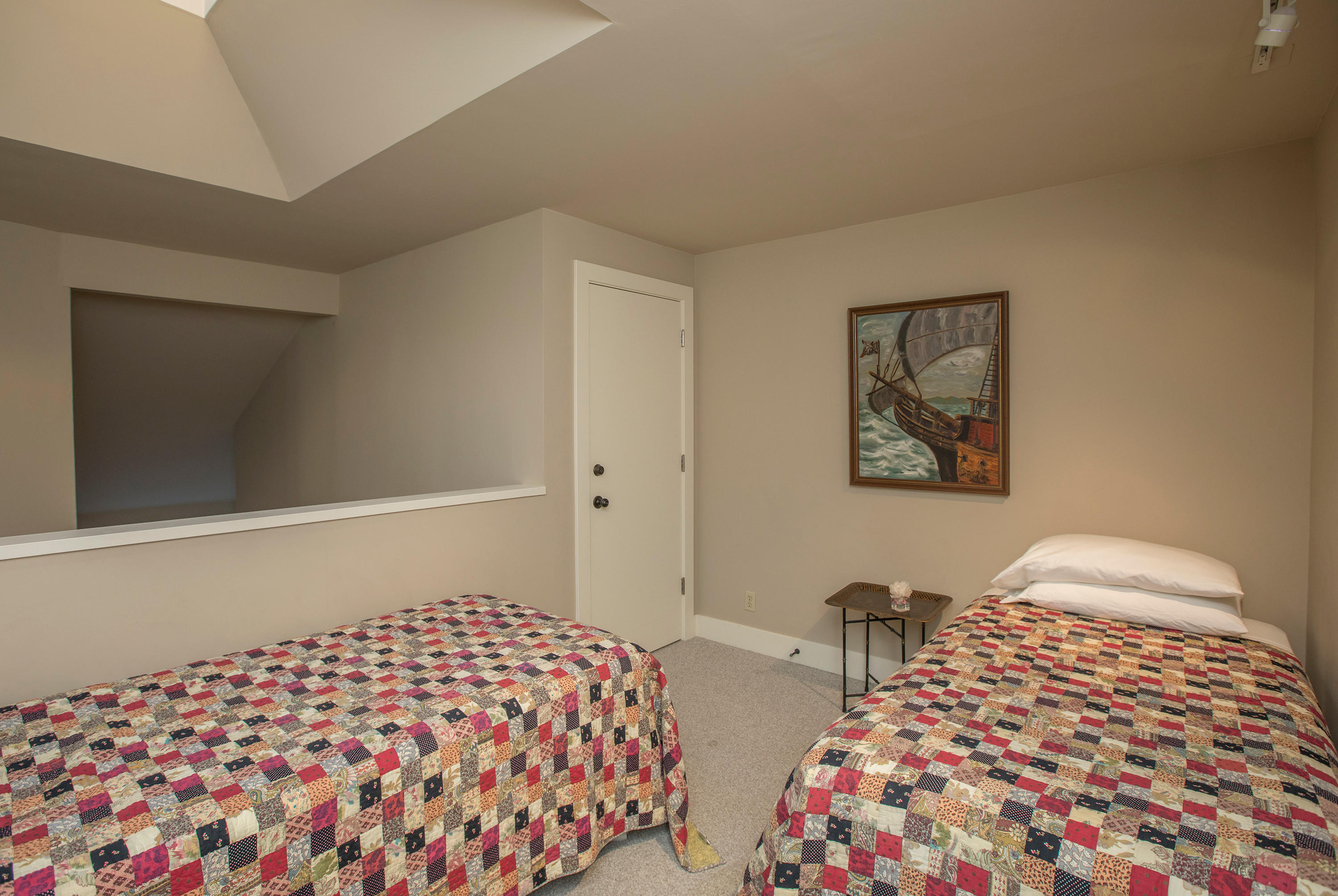 2 Rincon Point Lane Carpinteria, CA 93013 - Photo 18 of 31 a bedroom with bed and cupboard