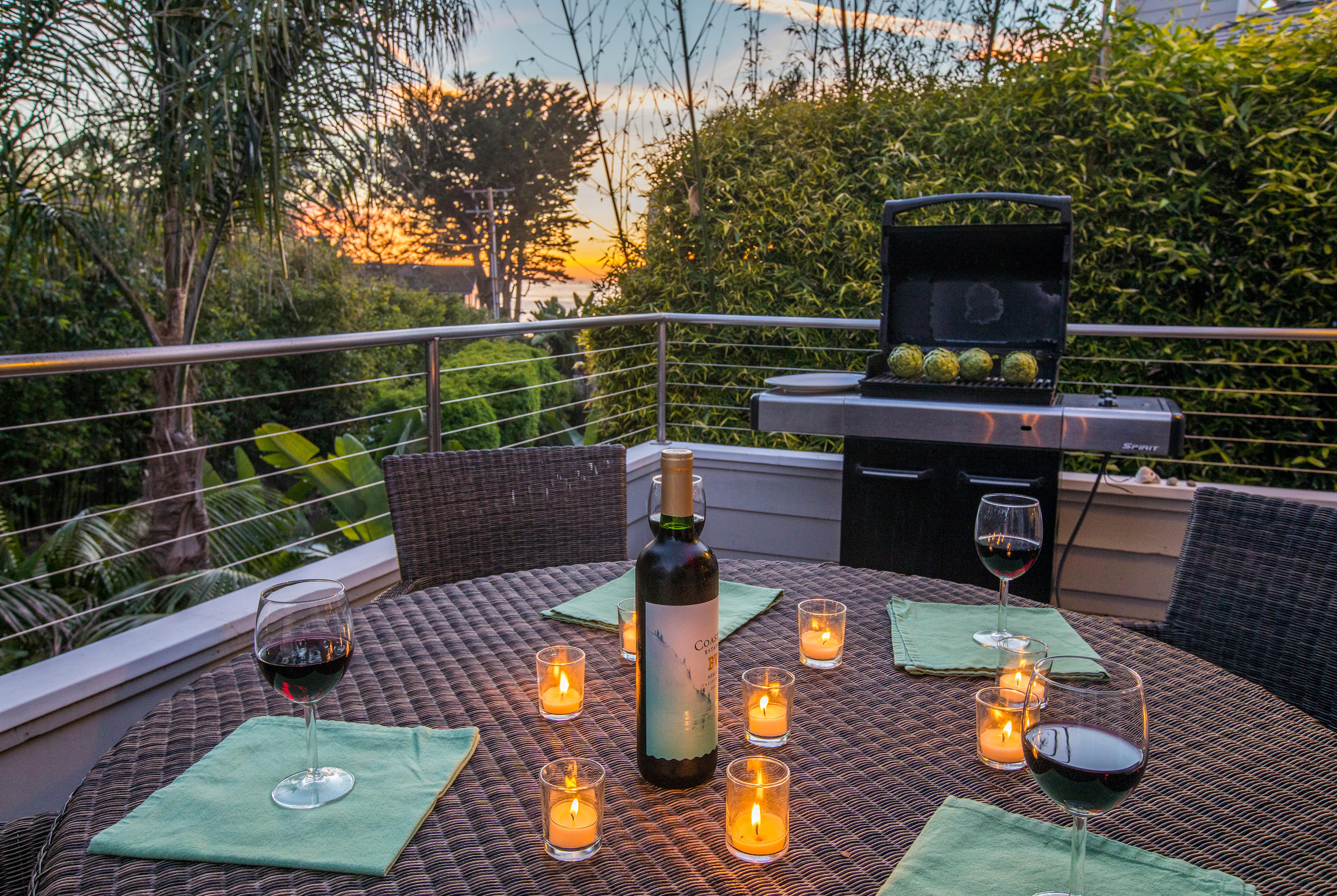 2 Rincon Point Lane Carpinteria, CA 93013 - Photo 22 of 31 a view of a deck with couches table and chairs with wooden floor