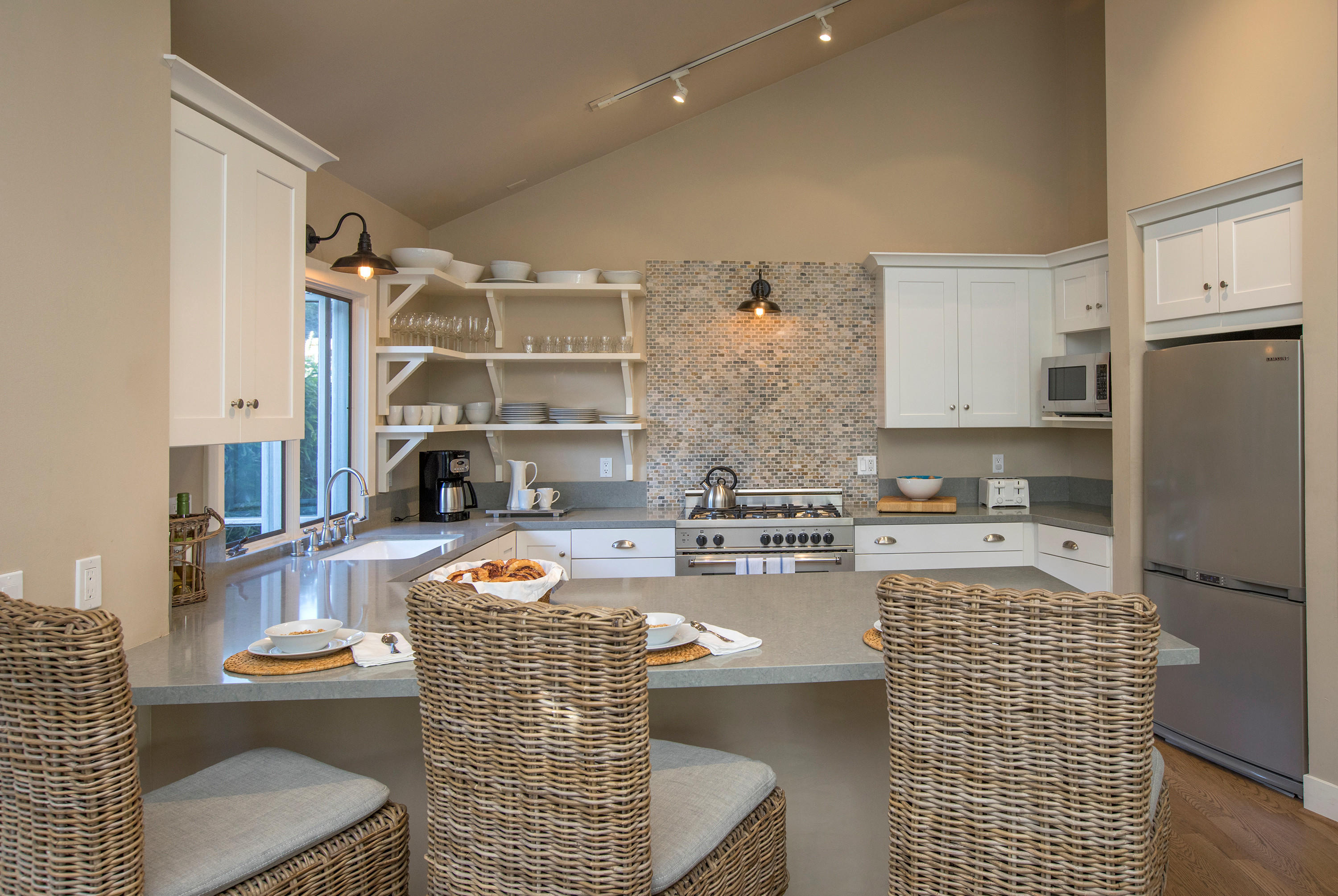 2 Rincon Point Lane Carpinteria, CA 93013 - Photo 4 of 31 a kitchen with a refrigerator and a stove top oven