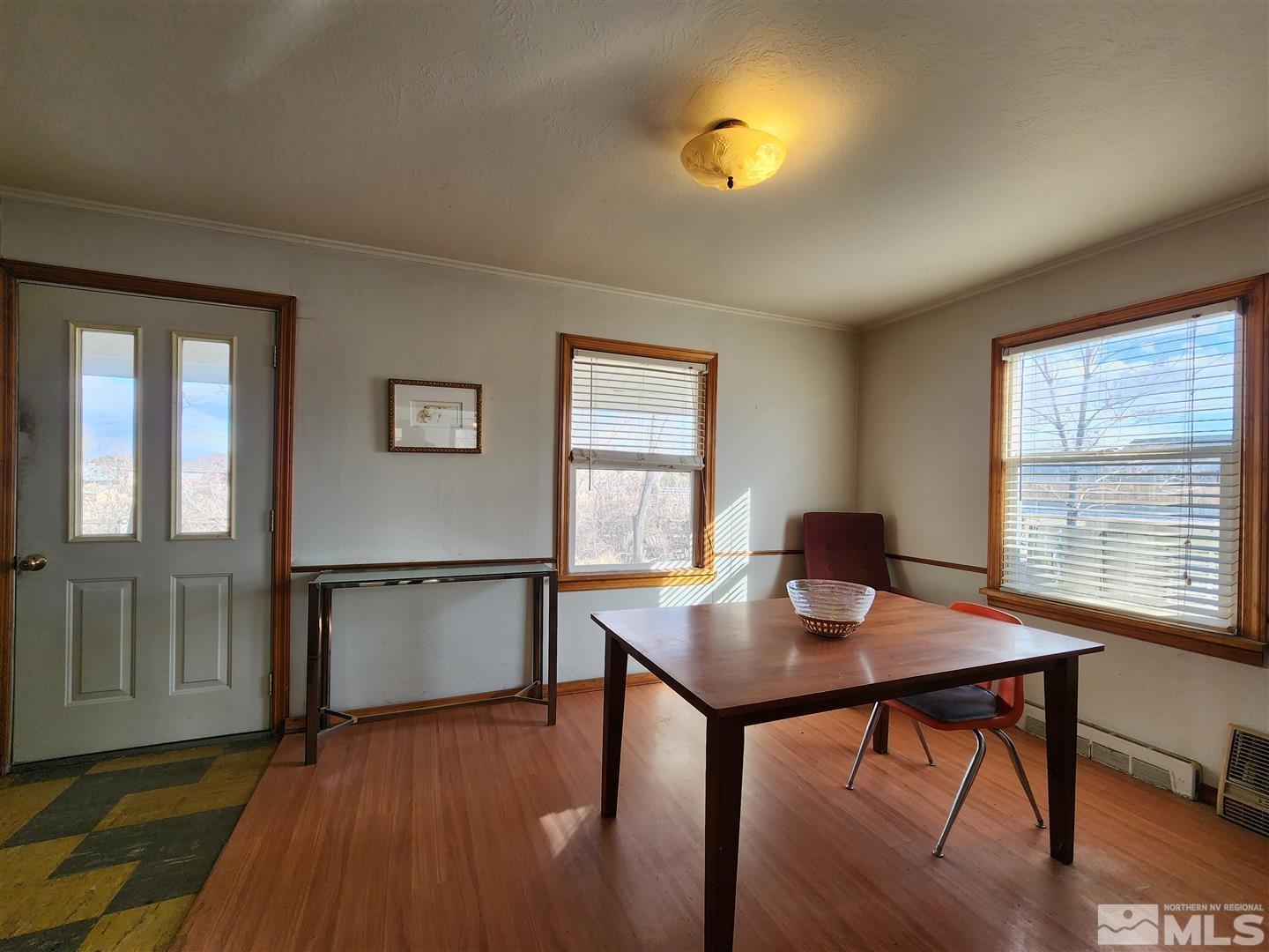 35 Highway 208 Yerington, NV 89447 - Photo 5 of 16 a workspace with furniture window and wooden floor