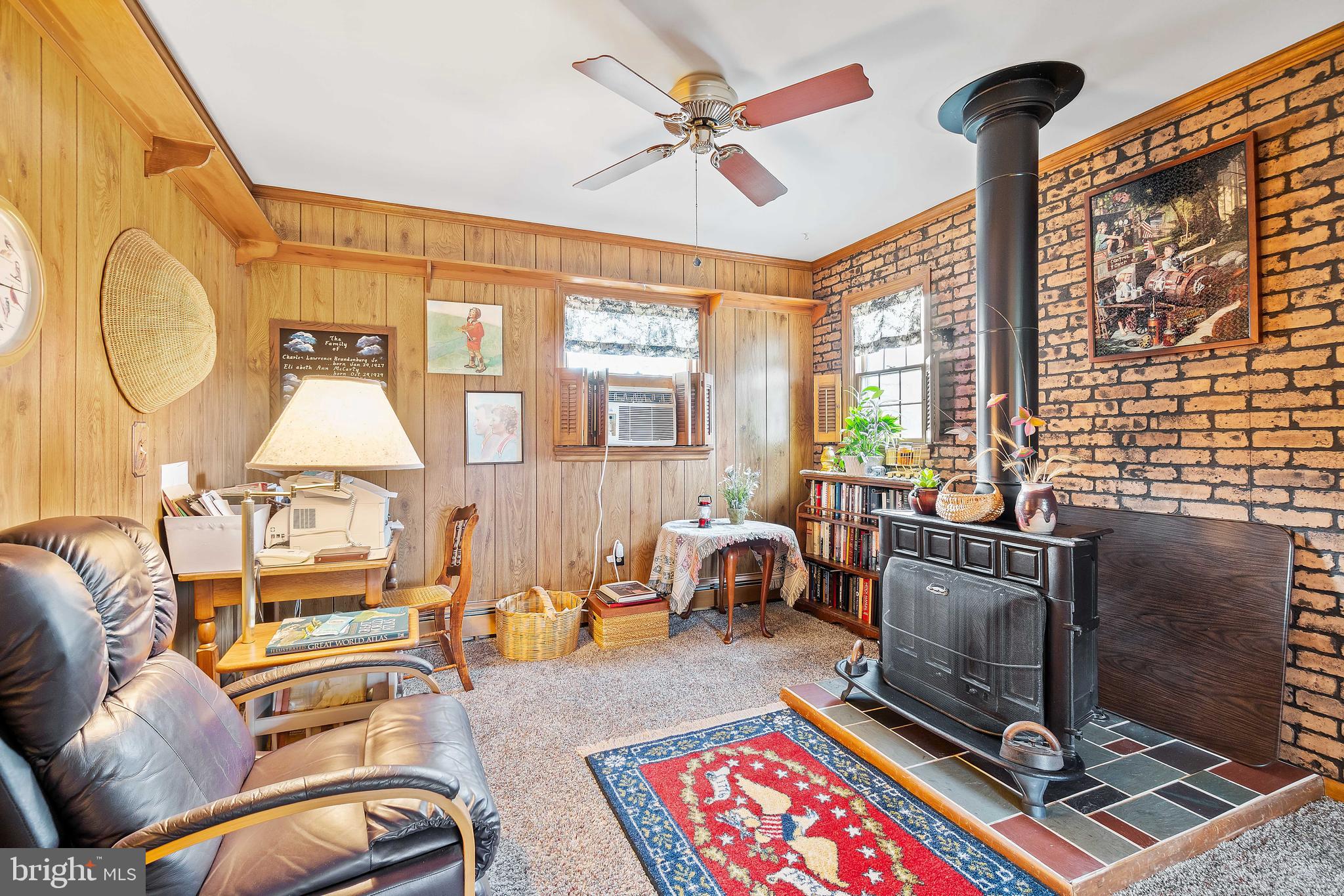 408 West Pearl Street Rising Sun, MD 21911 - Photo 21 of 39 Den on upper level. Wood stove for addtl heat.