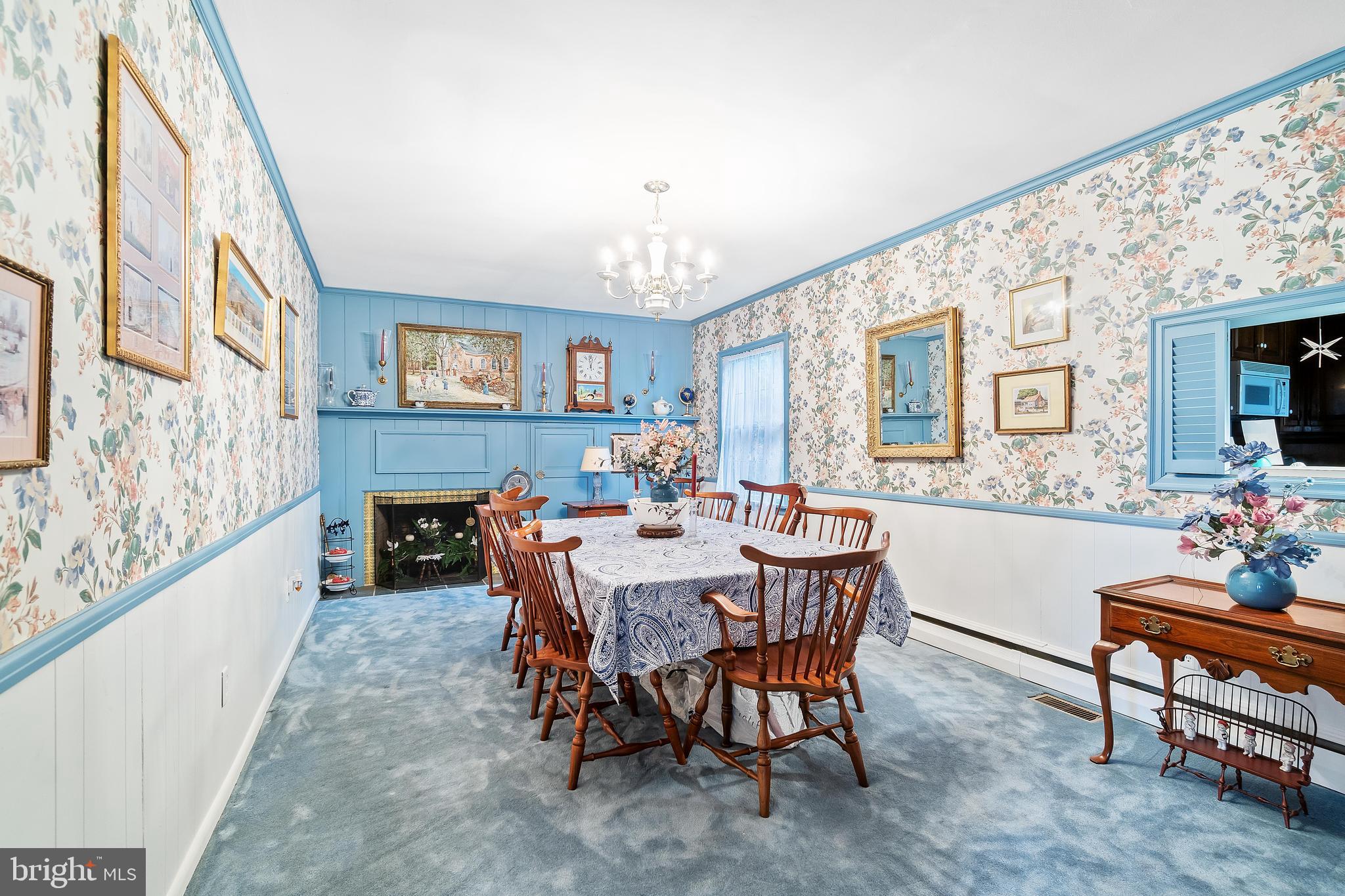 408 West Pearl Street Rising Sun, MD 21911 - Photo 4 of 39 Dining room has fireplace & pass thru to kitchen.