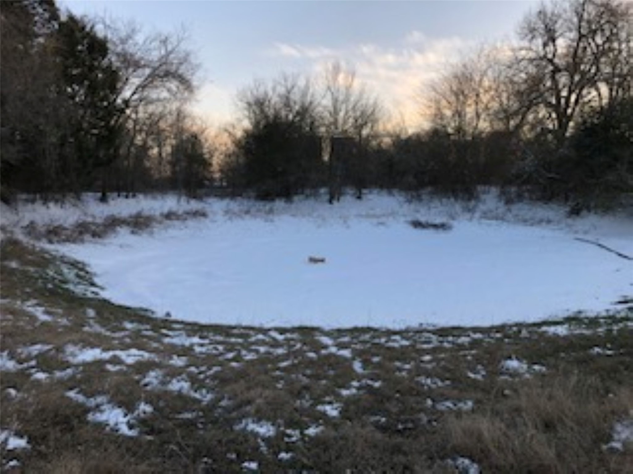 569 Burdette Wells Road Lockhart, TX 78644 - Photo 14 of 18 Wintertime view of the pond.