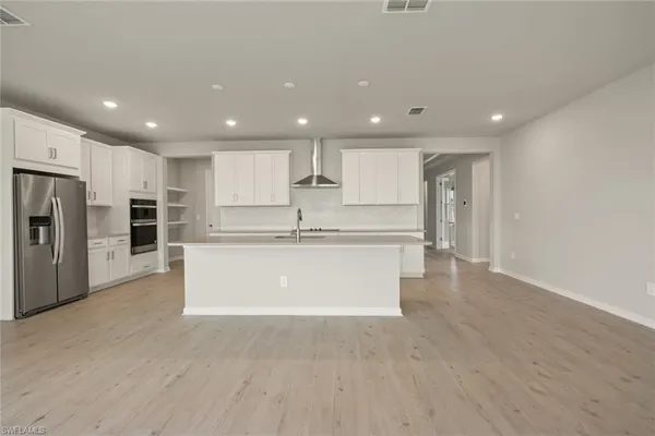 wooden floor and closet in a room