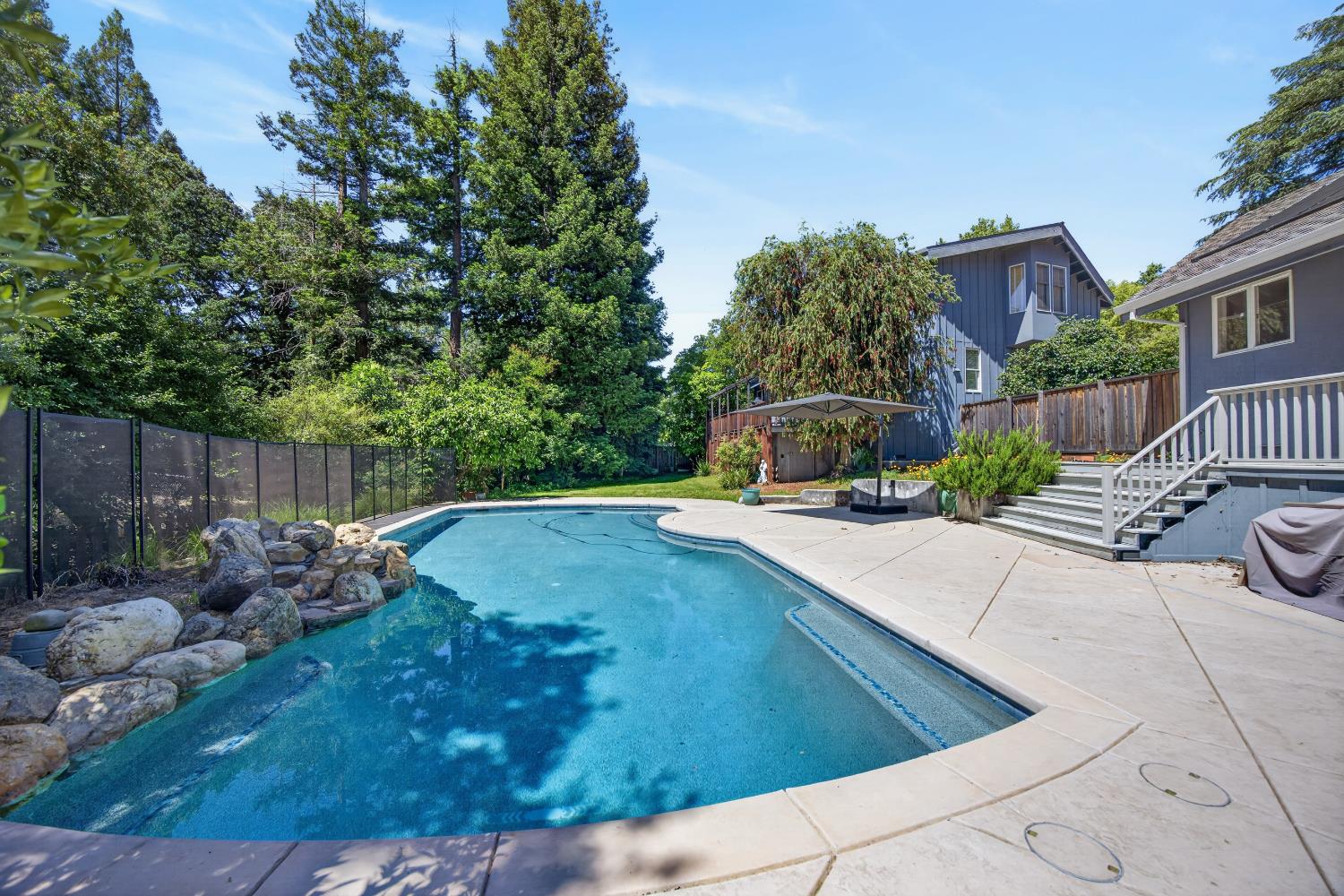 3940 Bannister Road Fair Oaks, CA 95628 - Photo 48 of 84 a view of a backyard with a sitting area