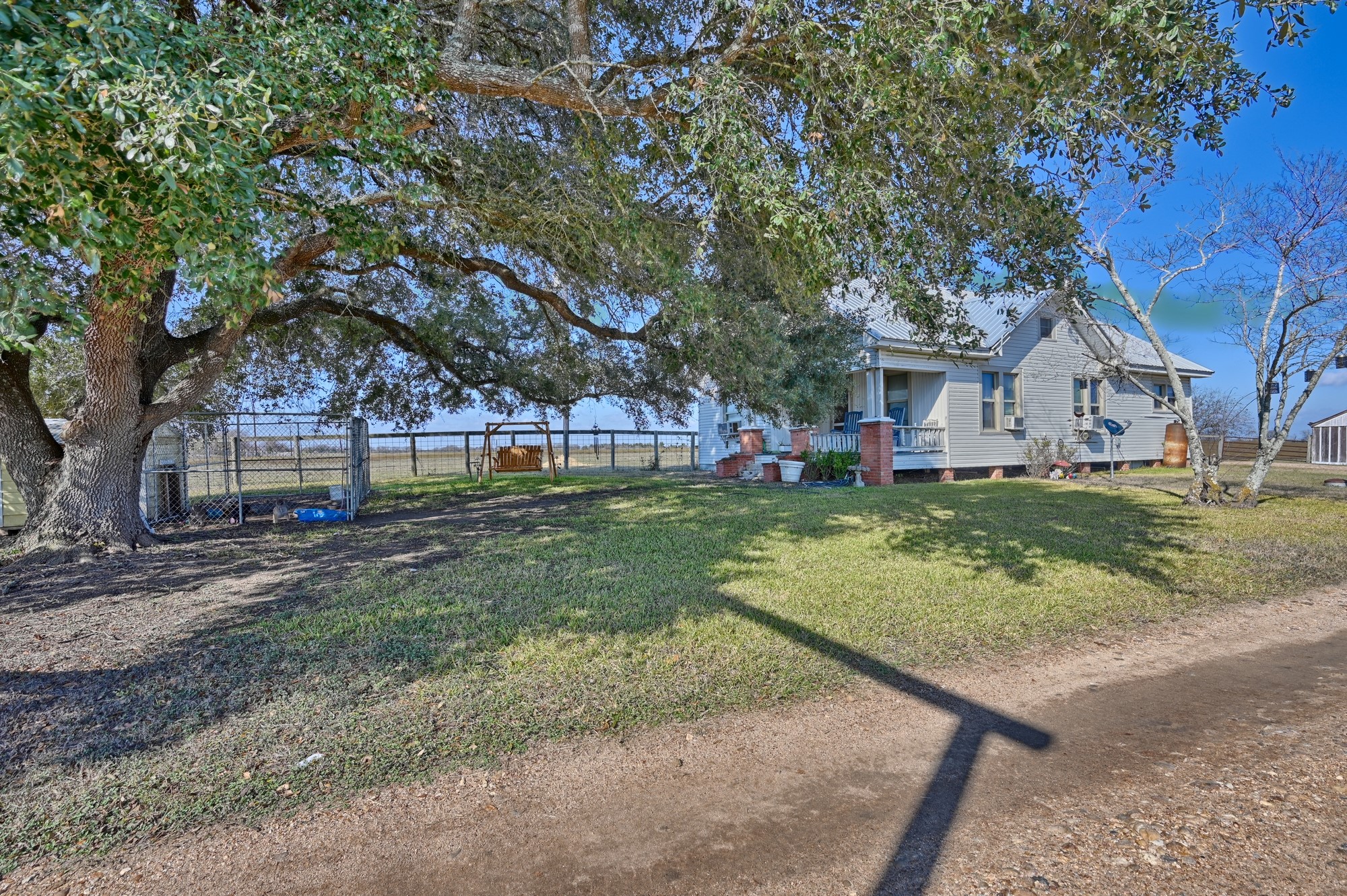 4898 FM 2502 Road Bleiblerville, TX 78931 - Photo 6 of 15 a view of a house with a yard